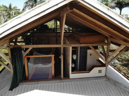 Timberframe house in an orchard by Corcovado park