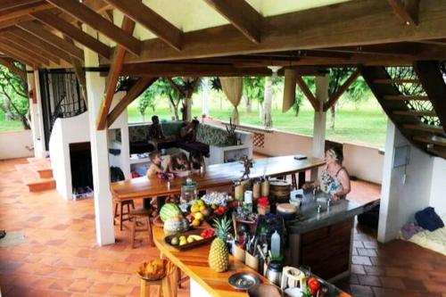 Timberframe house in an orchard by Corcovado park