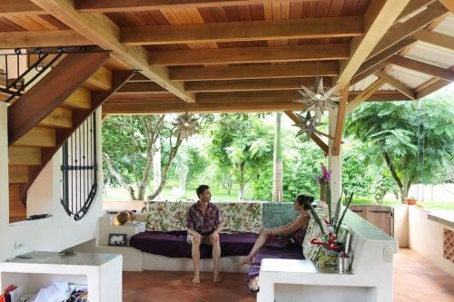 Timberframe house in an orchard by Corcovado park
