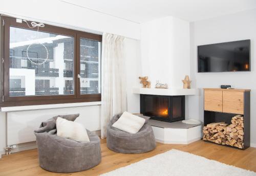 План поверхів, Cozy alpine apartment with fireplace in Ленцерхайд