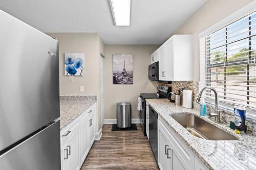 Cozy Townhouse - Gym Pool Golf Fast WiFi 2B2B in Tampa, USA