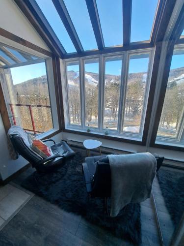 Superbe condo face aux pentes de ski Stoneham!!! in Stoneham (QC)