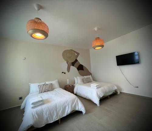 1 Corcega Beachfront Suites