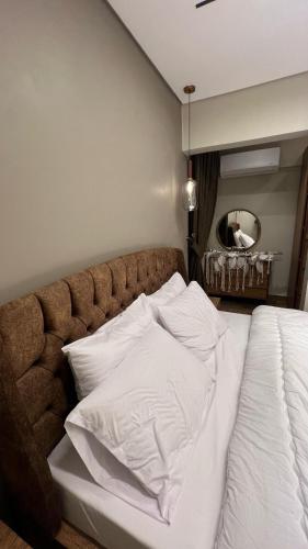 Luxury apartment El Mohandessen - Tap to explore photos