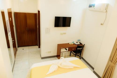 AMYLIE INN Room Type - Deluxe Double Room