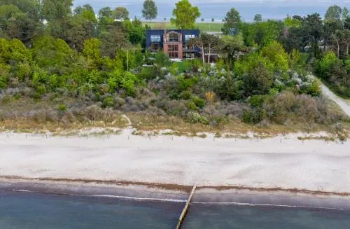 Villa Schmidt Apartments - Strandhaus direkt am Meer mit Sauna, Sport und Dünengarten - Komfort in Warnemünde, Deutschland