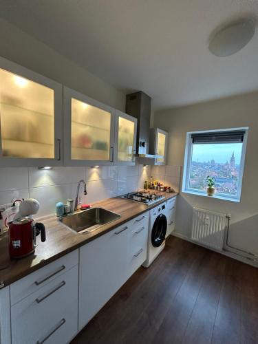 Kitchen, Apartment with city skyline in Leeuwarden City Center