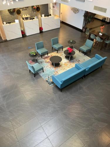 Hall, Grand Hotel Orlando at Universal Blvd - Shuttle to Theme Parks in Orlando (FL)