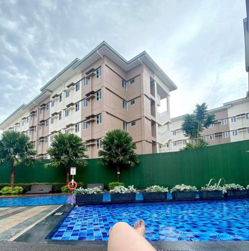 Swimming pool, Condotel-Minimalistic 2 minutes walk to SM Marilao near SM City Marilao