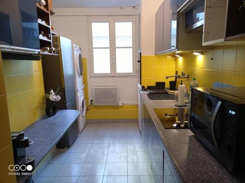 Aramis Colibri 72m2, lit king-size, baignoire duo hôte non professionnel, Paris (photo 10)