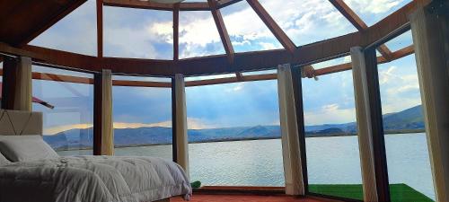 Los Uros vista Ciudad Puno in Puno Waterfront