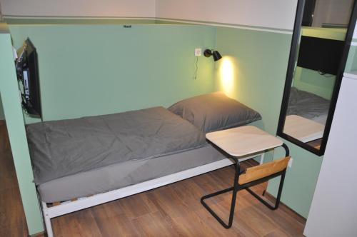 Bed in Male Dormitory Room