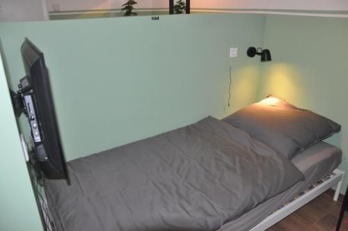 Single Bed in Dormitory Room