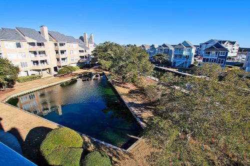 PC431, Above the Wake- Canalfront, Community Pool, Tennis courts and MORE!