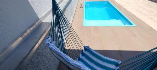 Casa com piscina em Pontal do Paraná - Balneário de Ipanema