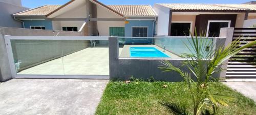 Casa com piscina em Pontal do Paraná - Balneário de Ipanema