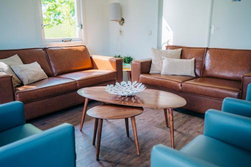 Buitenkant, B&B de Luwte Cottage in Bedrijventerrein Hessenpoort