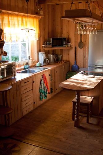 Kitchen, Tonise Holiday Houses in Upa