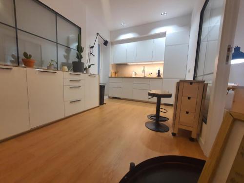 RentAdore Atocha Suites - Tap to explore photos