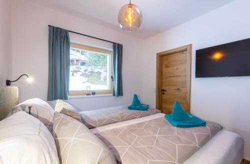 Appartements Uribi mit eigener Sauna by Schladmingurlaub