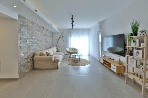 דירות קו ראשון לחוף - Apartments First line to the Beach in คีร์ยัต ยัม