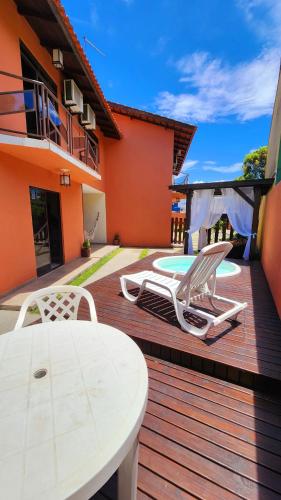 Three-Bedroom House room in Partiu Praia SC piscinas privativas ar condicionado internet próximo ao mar e centrinho três minutos a pé
