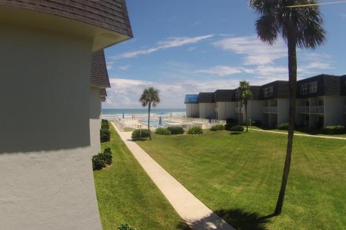 Beach, pool & ocean view from 2nd floor balcony located on the no-drive beach!