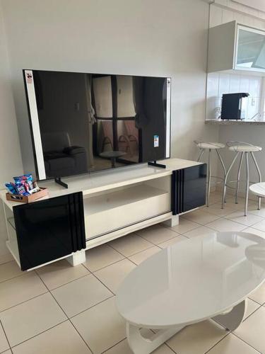 Flat completo no centro.
