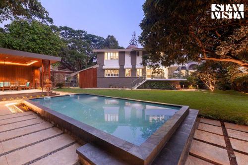 StayVista's House Of J - Embrace Leisure with Lawn, Pool, and Gazebo photo 1
