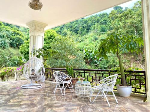 Shared lounge/TV area, Khu du lich sinh thai Co Lau Village in Lang Song Ca