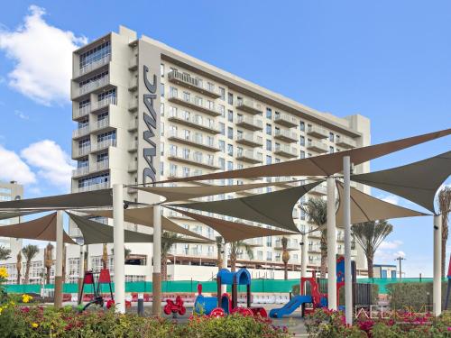 Playground, Breathtaking View 1BR Apt in Damac Hills 2 in Damac Hills 2