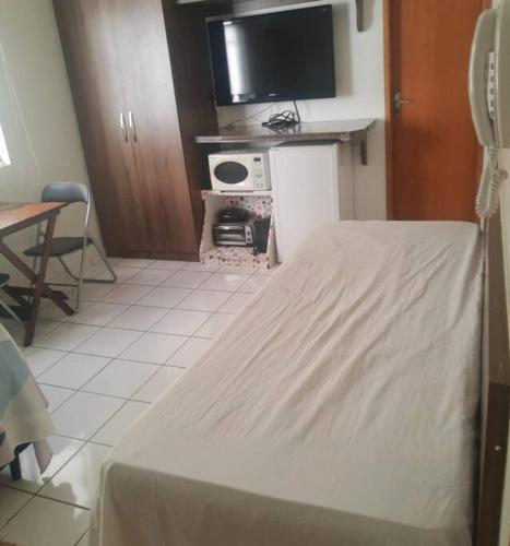 Flat no Centro de Caldas in Vila Olegario