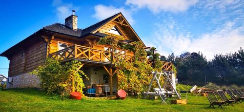 Viesnīcas āriene, Winnica Nad Źródłem - Domki w winnicy z kominkami i tężniami (Winnica Nad Zrodlem - Domki w winnicy z kominkami i tezniami) in Tarczek