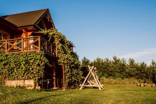 Viesnīcas āriene, Winnica Nad Źródłem - Domki w winnicy z kominkami i tężniami (Winnica Nad Zrodlem - Domki w winnicy z kominkami i tezniami) in Tarczek