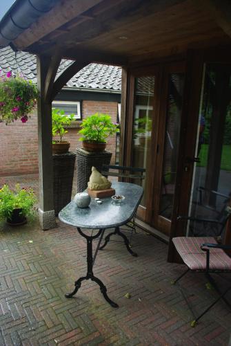 阳台/露台, Bed&Breakfast 't Eikeltje in 胡吉文