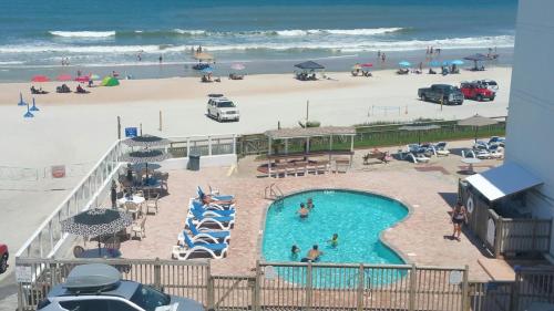 Strand, Cove Motel Oceanfront in Daytona Beach