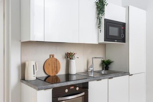 Modern Centrally Located Apartments - by Upstairs Room Type - Two-Bedroom Apartment Modern Centrally Located Apartments - by Upstairs Room Type - Two-Bedroom Apartment
