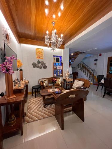Shared lounge/TV area, JMCL RESIDENCES in Tacloban City