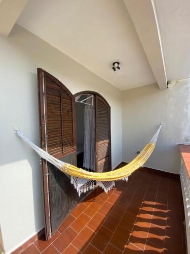 ระเบียง/ชานเรือน, Casa na Praia Grande in วีลาตูปี