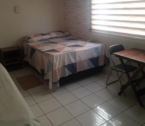 Flat no Centro de Caldas in Vila Olegario