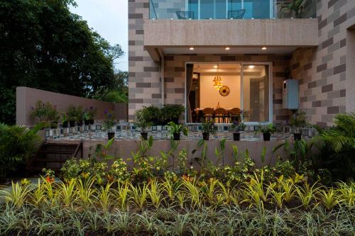 StayVista's Rosso with Outdoor Pool Theatre-Disc Room & Games Room