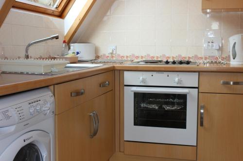 кухня, Lochinver Holiday Lodges & Cottages in Лочінвер