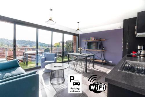 LE COIN COSY avec Balcon Terrasse parking privé et linge de lit compris