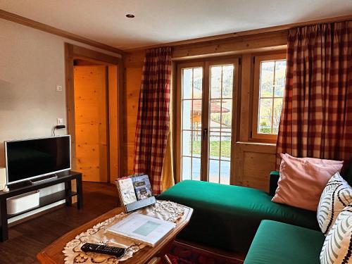 One Bedroom with mountain and garden view ground floor of Chalet Solaria Zweisimmen