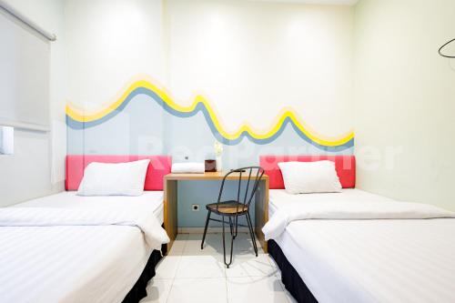 Hotel Capital Cikokol RedPartner Room Type - Deluxe Double Room