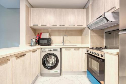 Elite LUX Holiday Homes - Cozy & Stylish 1 BR with Huge Pools & World Class Gym, Dubaj (fotografie 10)