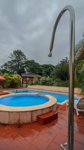 Peldbaseins, Yvyra Lodge in San Ignacio