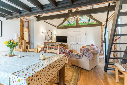 Jagatud salong / TV-ala, Mayeston Barn Holiday Home in Cosheston