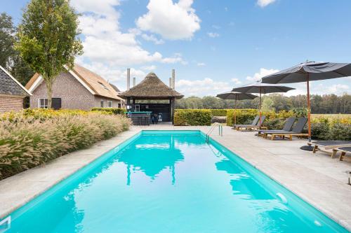 Het Koetshuis in Verspreide huizen Veldhoek