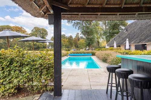 Het Koetshuis in Verspreide huizen Veldhoek